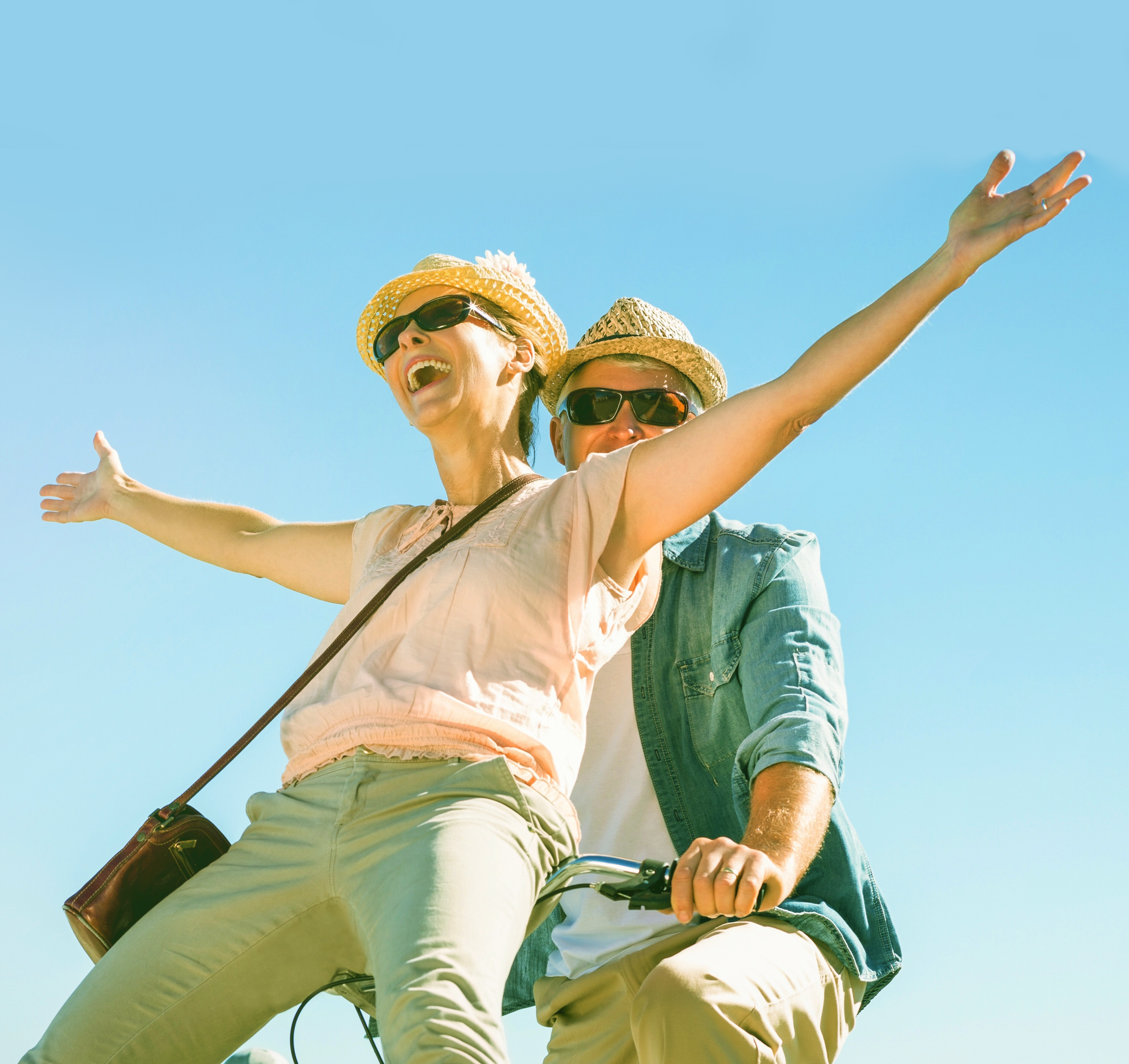 Older couple on a bicycle